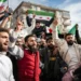 Para pengungsi Suriah yang tinggal di distrik Onder, Ankara, Turki, merayakan jatuhnya Presiden Suriah Bashar al-Assad pada 8 Desember 2024. Diego Cupolo/NurPhoto via Getty Images